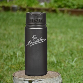 16 oz water bottle on stump