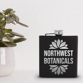 Northwest Botanicals flask on table