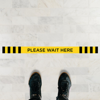 "Please Wait Here" Line Floor Sticker on a Flooring 1 example