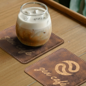 Cafe with logo engraved into custom coasters