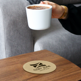 Custom engraved coaster for a coffee shop