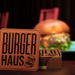 Engraved leatherette coaster set for a burger joint