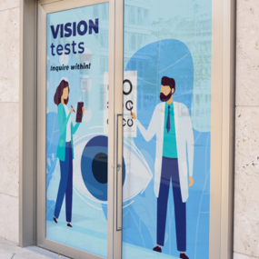 Perforated sticker storefront display for optometrist