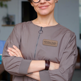 Teacher wearing a nice engraved name tag